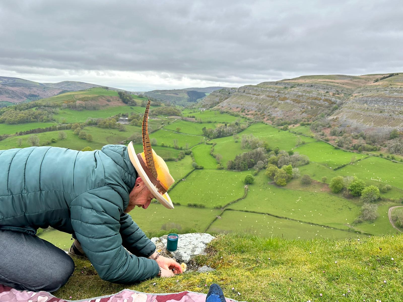 Rijusiddha making offerings at the top of Castell Bran